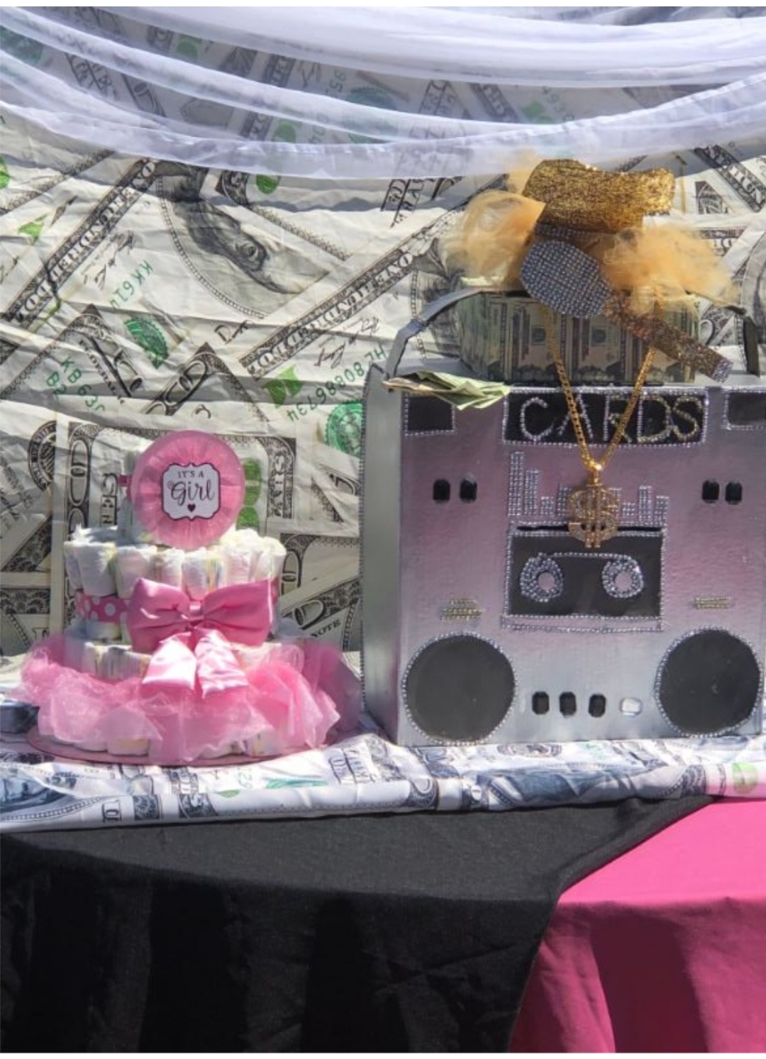 Money-themed 'It's a Girl' baby shower with diaper cake and boombox card box