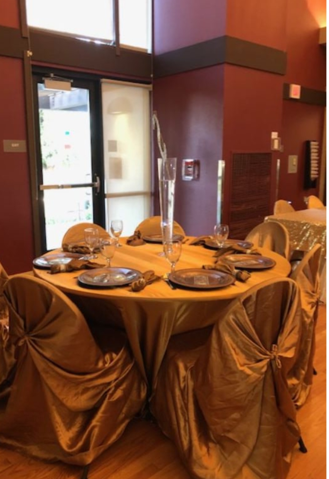 Elegant gold table setting designed by Step Forward By Trina