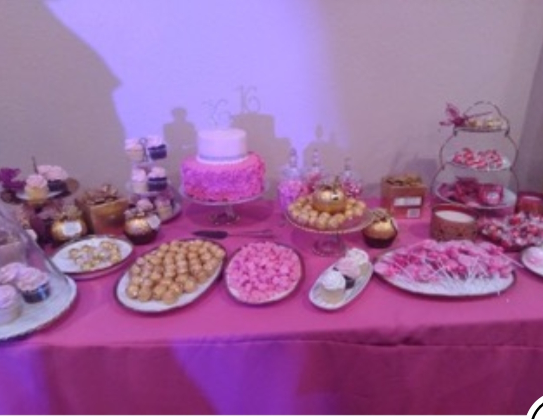Pink Sweet Sixteen dessert table with cake